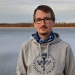 Portrait photograph of Simon Larsson taken in February 2023 at the frozen Sörfjärden bay in Södermanland